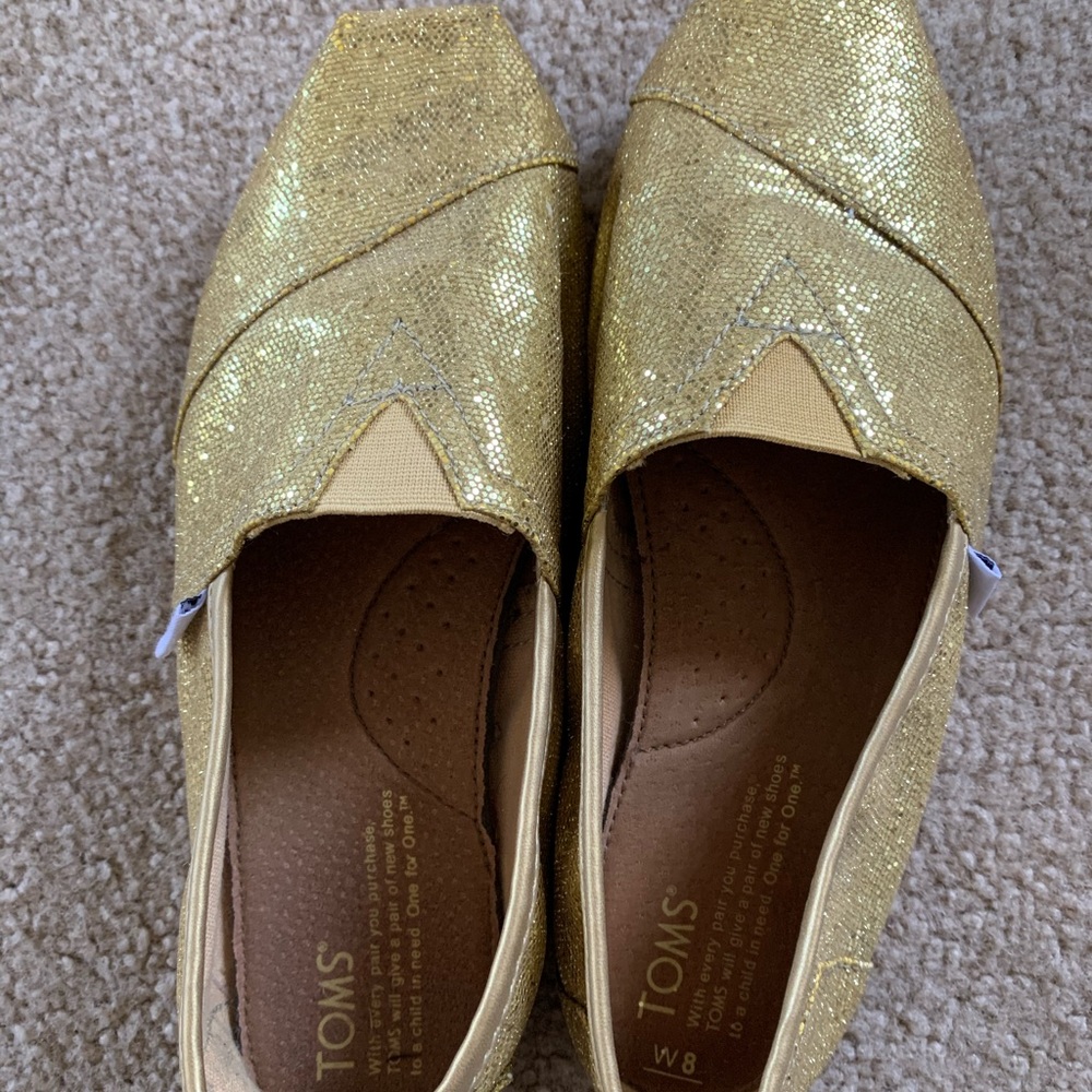 Gold sequin women’s Tom’s size 8